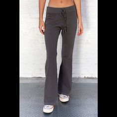 Soft Cotton Blend Tie Yoga Pants With A Big Flare Pant Leg. Fabrics: 100% Cotton Measurement: 10" (30 Cm) Rise, 34" (81 Cm) Inseam, 15" (66 Cm) Waist (Stretches) Made In: Italy Fitted Casual Cotton Wide Leg Pants, Fitted Cotton Wide Leg Casual Pants, Mid-rise Cotton Yoga Pants For Loungewear, Trendy Mid-rise Loungewear Pants, Trendy Mid-rise Pants For Loungewear, Fitted Casual Wide Leg Pants For Loungewear, Fitted Mid-rise Cotton Yoga Pants, Fitted Wide Leg Casual Pants For Loungewear, Trendy Wide Leg Yoga Pants