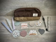 the contents of a craft kit are laid out on a table