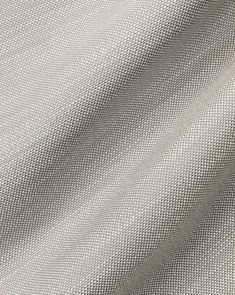 an image of a white fabric textured with some sort of clothing or material