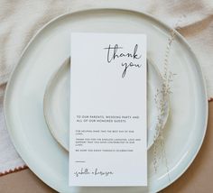 a white plate with a thank you card on it