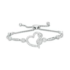 A delightful symbol of your devotion, this diamond tilted heart bolo bracelet from the I Promise To™ Collection shines as an unmistakable sign of your forever love. Created in sterling silver, this look showcases a sculpted infinity symbol wrapped around one side of a heart-shaped outline. Diamonds line the center design in shimmer while diamond stations - each artfully set to enhance size and sparkle - glisten between beaded links. Radiant with 3/8 ct. t.w. of diamonds and a brilliant buffed lu Adjustable Diamond Heart Bracelet For Valentine's Day, Adjustable Heart Bracelet For Anniversary, Valentine's Day Adjustable Diamond Heart Bracelet, Adjustable Heart-shaped Diamond Jewelry, Classic Adjustable Heart Bracelet For Valentine's Day, Adjustable Classic Heart Bracelet For Valentine's Day, Heart Shaped Diamond Bracelet For Valentine's Day, Adjustable White Gold Heart Bracelet, Adjustable Heart Cut Fine Jewelry