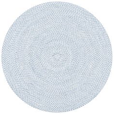 a circular blue and white pattern on a white background, with small dots in the center