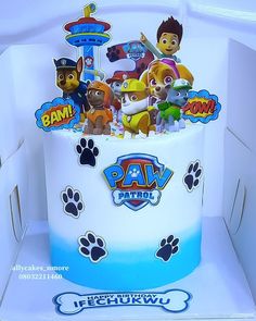 a paw patrol birthday cake with lots of dogs and puppies on it's top