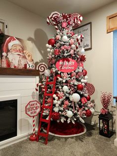 a christmas tree decorated with candy canes and ornaments in red, white and silver