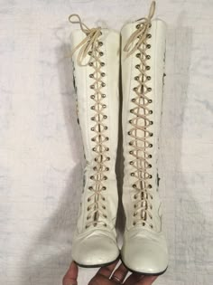 "1960s / early 70s GoGo boots white leather lace up embroidered floral detail w/tiny metal studs around the embroidery the flowers are embroidered patches and edges curl up a bit rubber heel and sole caps good vintage condition, light wear light scuffs, stains, age wear instep of right boot has a slight gap between sole and leather when worn the foot should secure this area w/it's weight could be taken to shop to secure *priced w/the possibility of that cost in mind label size 9 M, fit me true t Vintage White Boots, Vintage Wedding Boots, 70s Gogo Boots, 60s Gogo Boots, Wedding Dress Boots, Vintage Lace Up Boots, White Wedding Boots, 60s Boots, 60s Gogo