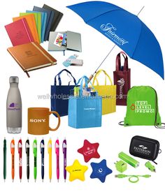 promotional items including an umbrella, notebooks and pens