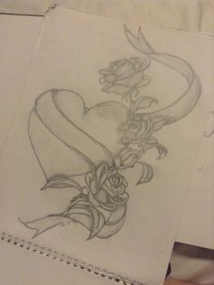 a drawing of a heart with roses on it