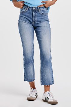 The 90s Jean in Mozzie presents a timeless style with a modern twist. Crafted from stretch denim with a high rise fit that sits slightly lower on the waist and fitted in the hips, these ankle skinnies promise a chic, sleek fit. 9 1/2" Front Rise (include waistband), 10" Leg Opening, 28" inseam (Size 27) 90% COTTON 8% POLYESTER 2% SPANDEX Machine wash cold, Tumble dry low Imported Zip fly and button closure Five-pocket style Classic Cropped Leg Denim Flare Jeans, Everyday Dark Wash Jeans With Frayed Hem, Mid-rise Medium Wash Flare Jeans, High Rise Cropped Denim Jeans For Everyday, Everyday Dark Wash Mid-rise Flare Jeans, Mid-rise Cropped Jeans In Denim Blue For Everyday, Trendy Medium Wash Cropped Jeans For Fall, High Rise Medium Wash Jeans For Fall, Trendy Cropped Jeans In Medium Wash For Fall