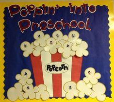 a bulletin board with popcorn on it and the words popin'into preschool written in black