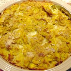 a casserole dish in a plastic container on a table