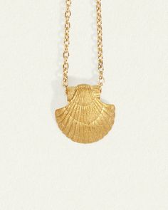 The Sia necklace is an ocean keepsake adorned to be treasured. Seashells are magical healers and messengers of powerful but gentle tools of transformation. They connect us to the ocean and the aquatic energy that she holds. ✦ Chain measures 16 inches with 3 inch clasp ending / 18K Gold Vermeil ✦ Pendant measures .85 inches / 18K Gold Vermeil + Garnet Spiritual Healing Shell Jewelry, Spiritual Shell Necklace As Gift, Gold Shell Necklace, Shell Charm Necklace, Energy Protection, Water Energy, Gemstone Properties, Solid Gold Earrings, Vermeil Jewelry