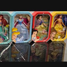 the disney princess dolls are in their original packagings and they look like they were made from plastic