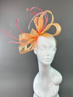 Peach bow fascinator. Made of sinamay. Attaches with either headband or hair clip (interchangeable) One size fits all. Please note all sales are final. Orange Fascinator For Kentucky Derby Races, Orange Fascinator For Spring Races, Orange Spring Fascinator For Races, Orange Spring Races Fascinator, Orange Headpieces For Party At Royal Ascot, Spring Races Orange Fascinator, Elegant Orange Headpiece For Spring, Orange Spring Evening Fascinator, Spring Evening Orange Fascinator