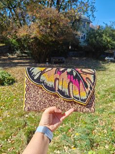 "Colorful Leaf-Shaped Beaded Clutch Purse | Artisan Handcrafted | Summer Festival Crossbody Bag | Unique Gift for Her.\" Discover the perfect blend of artistry and functionality with our handcrafted beaded clutch purse. Designed with a unique leaf-shaped top, this purse is not just an accessory; it is a statement piece that stands out in any crowd. Ideal for summer festivals, concerts, or a night. Out, it offers a stylish way to carry your essentials. Step out in style with our stunning handmade beaded clutch purses, the perfect accessory to add a splash of color and a modern flair to any ensemble. These eye-catching bags feature intricate hand-beaded designs that seamlessly blend contemporary chic with classic elegance, making them versatile for both modern and traditional outfits. Length Party Bags With Multicolor Embroidery And Beaded Details, Elegant Beaded Clutch For Festivals, Handmade Multicolor Clutch For Summer, Summer Beaded Clutch As Gift, Multicolor Sequined Bags For Summer, Multicolor Summer Festival Clutch, Summer Festival Multicolor Clutch, Multicolor Sequined Bag For Summer, Summer Beaded Clutch Shoulder Bag