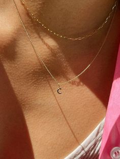 Your new favorite wear-everywhere jewelry staple, this gold letter necklace crafted in solid gold is waterproof, tarnish-free, and made to last a lifetime. Styled Jewelry, Gold Initial Pendant, Jewelry Staples, Gold Letter, Initial Necklace Gold, Letter Charm, Dainty Gold Necklace