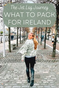 a woman walking down the street with text overlay that reads, the jet lag journey what to pack for ireland