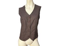 Vintage brown vest, 70's, no tags, buttons up the front, classic cut. Vest is in great condition, measurements are bust up to 36" waist up to 30" length 21" Vintage Brown Sleeveless Outerwear, Brown Vest Women, Retro Brown Cotton Vest, Brown Sleeveless Single-breasted Vest, Vintage Brown Vest With Button Closure, Vintage Tailored Single-breasted Vest, Brown Vest, Women's Vest, Vest Outfits