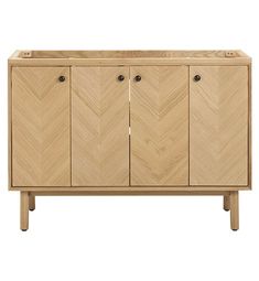 the sideboard is made from wood and has three doors, two drawers and one door