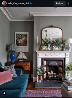 a living room filled with furniture and a fire place