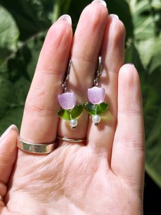 These whimsical beaded tulip earrings are too cute to pass up! Sweet and simple and available in three gorgeous spring colours, you'll be complimented left and right when you pair these darlings. Earring hooks are nickel free silver, and studs/ball posts are stainless steel. If you would like to swap out the pictured findings for another style, just leave a note for me at checkout! Earring Care:- Avoid contact with makeup or alcohol- Store in a cool, dry place- Keep dry (don't wear in the shower Beaded Tulip Earrings, Beaded Tulip, Alcohol Store, Kindle Aesthetic, Tulip Earrings, Spring Colours, Earring Hooks, Crafts Ideas, Too Cute