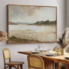 a painting hanging on the wall above a dining room table with chairs and place settings