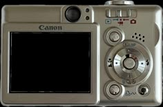 a silver camera with a white screen on it