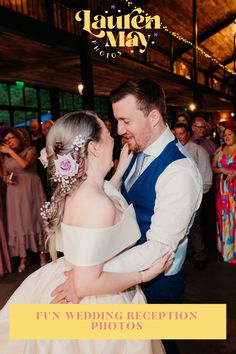 a bride and groom dancing together at their wedding reception with guests in the background text reads, fun wedding reception photos