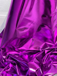 a purple cloth is laying on the floor