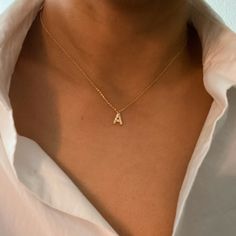 This Understated Beauty Initial Necklace is the perfect way to subtly stand out. With high-quality stones and craftsmanship, it provides a powerful sparkle that is sure to turn heads. Great for everyday shine or layering with other pieces, it's the ideal accessory for any occasion. Approximately 16" with a 2" extender 18k gold plated brass, cubic zirconia Lead and Nickel free Designed in US, crafted in China A Initial Necklace, Necklace K, Visor Hairstyles, Necklace Initial, Hair Setting, Perfume And Cologne, Treating Yourself, Initial Pendant, Fine Jewelry Collection