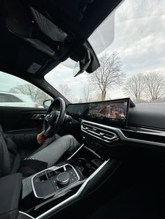 the interior of a car with an entertainment system