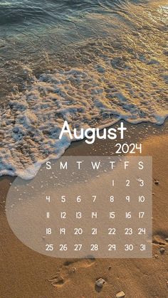 an image of a calendar on the beach with footprints in the sand and waves coming toward it