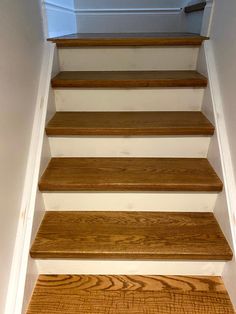 the stairs are made of wood and have no carpet on them, so they don't need to be painted