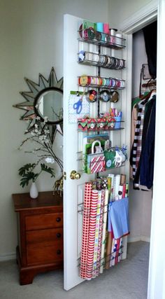 the door is open to reveal an organized closet