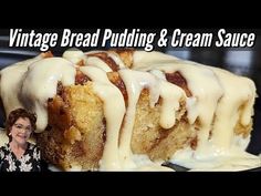 a woman standing in front of a cake with icing on it and the words vintage bread pudding & cream sauce