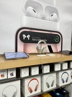 an apple store display with headphones on it