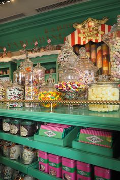 the shelves are filled with candy and candies