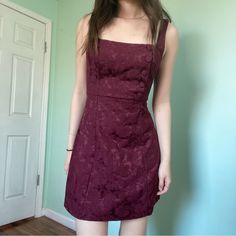 Urban Outfitters Size 2 Thick Maroon Floral Dresss A-Line With Button Detailing Waist: 26in Total Length: 36in For Reference I Am 5’6” Red Sleeveless Mini Dress With Buttons, Urban Outfitters Dresses With Buttons For Day Out, Fitted Mini Dress From Urban Outfitters For Casual Wear, Spring Dresses With Buttons By Urban Outfitters, Spring Dresses With Buttons From Urban Outfitters, Urban Outfitters Spring Dresses With Buttons, Burgundy Dress Short, Short Maroon Dress, Maroon Mini Dress