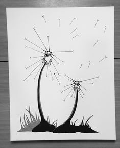 a black and white drawing of two dandelions in the air with seeds coming out of them