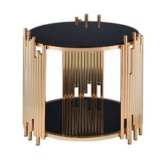 a black and gold side table with candles on it