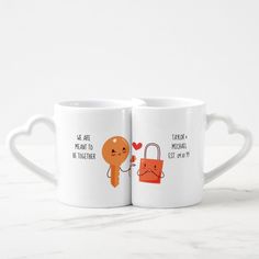 two coffee mugs with cartoon characters on them