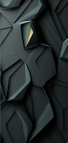 an abstract black and gold wallpaper with shapes that appear to be made out of paper