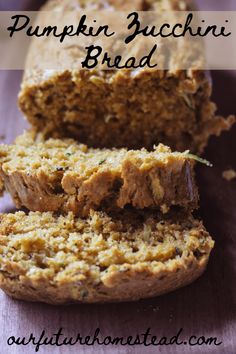 a loaf of pumpkin zucchini bread cut in half and stacked on top of each other