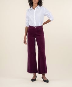 Rock a vintage-chic look in high rise, full-length flare jeans made from soft corduroy finished with raw hems in a rich hue and our fab ab front pockets that smooth and add comfort. Fabric: 98% Cotton, 2% Spandex Size & Fit: Inseam: 29", Leg Opening: 23", Rise: 10 1/2" Color: MULBERRY Styled with: Millia Front Crop Shirt (KT134501) Statement Jeans, Corduroy Coat, Boyfriend Shorts, Denim Coat, Linen Shorts, Colored Denim, Wide Leg Denim, Cropped Denim, Sweater Blouse