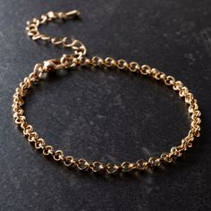 "Find the 7.5\" Gold Rolo Chain Bracelet by Bead Landing™ at Michaels. This rolo chain bracelet from Bead Landing is a wonderful piece of inspiration for your creativity. Featuring a shiny metallic finish and round links, add a fun mix of charms to craft a lovely handmade bracelet that shows off your personality. This rolo chain bracelet from Bead Landing is a wonderful piece of inspiration for your creativity. Featuring a shiny metallic finish and round links, add a fun mix of charms to craft a Bead Landing, Rolo Chain, Handmade Bracelet, Handmade Bracelets, Chain Bracelet, Charm Bracelet, Charms, Bracelet, Beads