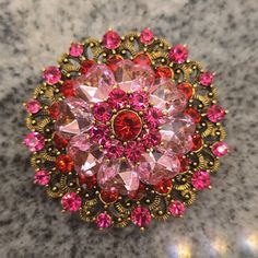 2.1 Inches Wide Round Brooch With Multiple Shapes And Shades Of Pink Rhinestones Circling. Beautiful Gifts Or Accent To Any Outfit, Hat, Scarf, Or Bag! Vintage Style, Very Fancy! Bundle W Other Listings For The Best Deal! Pay One Shipping Fee And Buy Multiple Items From My Closet In One Transaction. Reasonable Offers Always Welcome! Pink Brooch Pins For Party, Pink Party Brooch Pins, Pink Brooch For Valentine's Day Gift, Pink Brooches For Valentine's Day Gift, Pink Crystal Brooch Jewelry, Pink Crystal Jewelry Brooch, Pink Crystal Brooches As Gift, Pink Rhinestone Brooches For Gifts, Pink Rhinestone Brooches As Gift