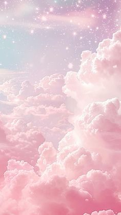 the sky is filled with pink clouds and bright stars in the sky, as well as white fluffy clouds