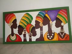 a painting on the side of a wall with african women in colorful headdresses