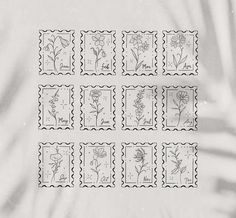 six stamps with flowers on them in black and white