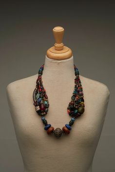 Bring a pop of color and energy to your jewelry collection with this supercharged antique Moroccan necklace. The necklace features a multitude of vibrant and colorful beads, each hand-selected to create a truly unique and eye-catching piece. Crafted from high-quality materials, this necklace is both durable and lightweight, making it perfect for daily wear. The combination of antique design elements with the modern use of colorful beads gives the necklace a playful and energetic feel that is sure to bring a smile to your face. The necklace features a unique and intricate design, with each bead carefully placed to create a one-of-a-kind look. The mix of bright colors and antique style elements gives the necklace a bohemian feel that is sure to turn heads wherever you go. Whether you're dres Moroccan Necklace, Moroccan Jewelry, Wedding Jewellery Necklace, Antique Design, Intricate Design, Wedding Necklace, Antique Style, Design Element, Bright Colors