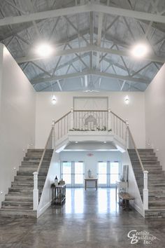 the inside of a large building with stairs